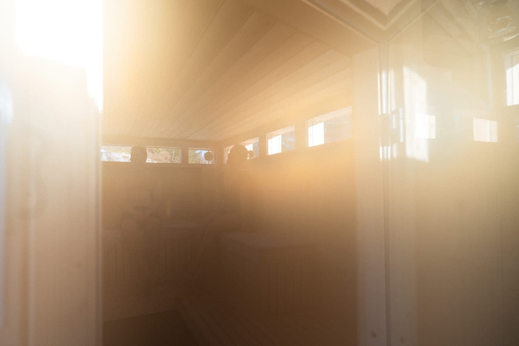 Sunlight through the windows inside the sauna